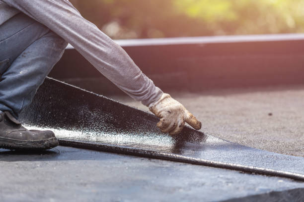 Professional Basement Waterproofing technician working in Dundee, OR